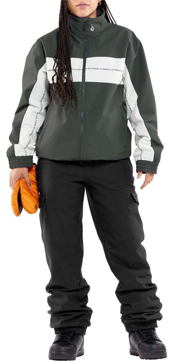 Volcom Women's Wilding Shell Pants 2024 - A pair of black snow pants with a white stripe down the side and a zipper pocket on the thigh.