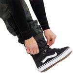 Volcom Women's Wilding Shell Pants 2024 - A pair of black snow pants with a subtle camouflage pattern on the upper thigh area.