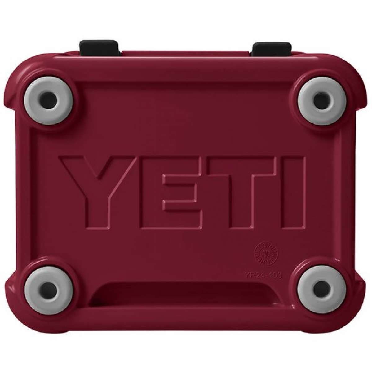 Yeti Roadie 24 Hard Cooler - A red cooler with a handle on top and two latches on the front.