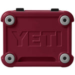 Yeti Roadie 24 Hard Cooler - A red cooler with a handle on top and two latches on the front.