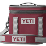 Yeti Hopper Flip 8 Personal Cooler - A red cooler with a zippered top and two handles, one on each side.