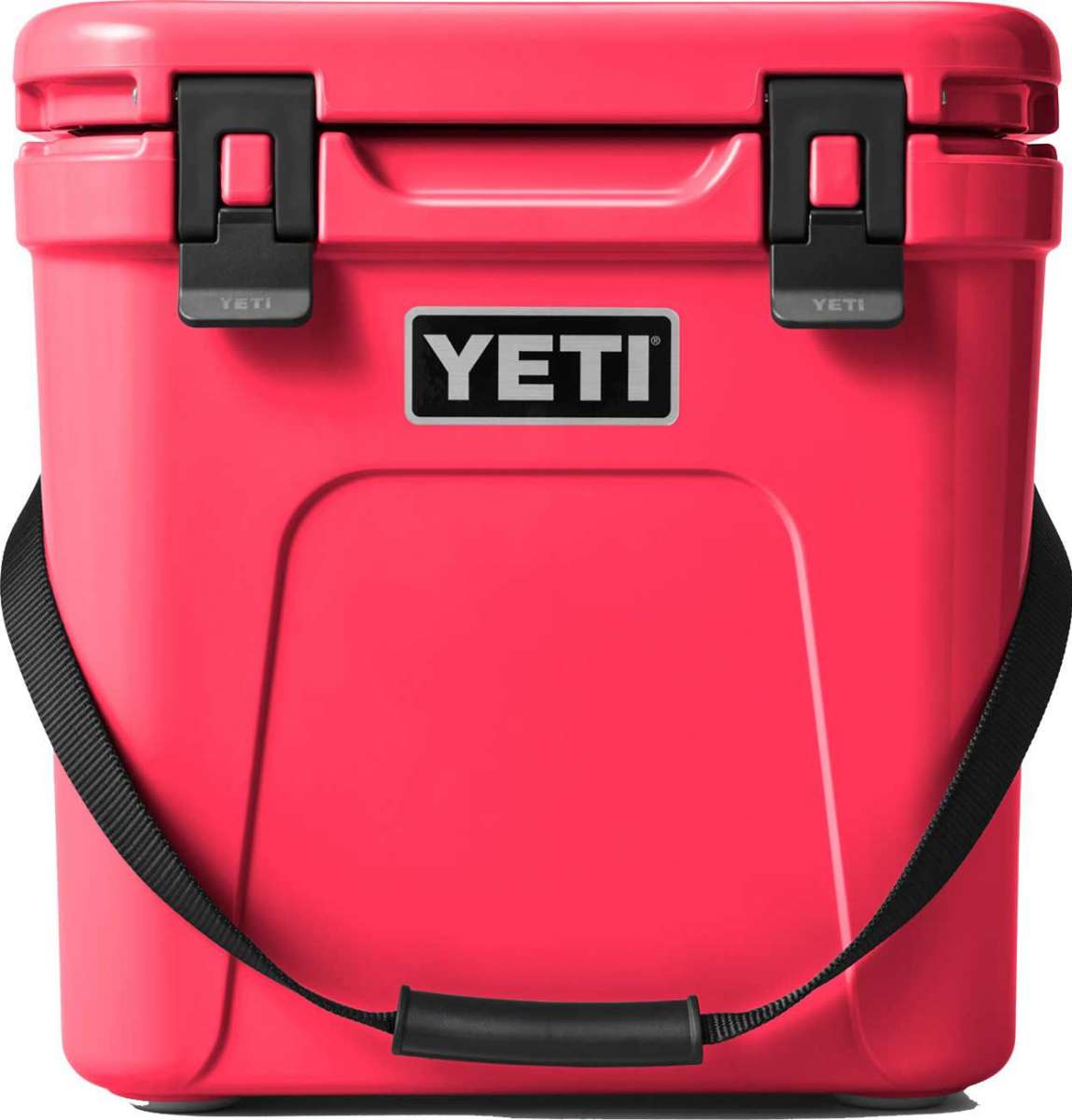Yeti Roadie 24 Hard Cooler - A red cooler with a handle on top and two latches on the front.