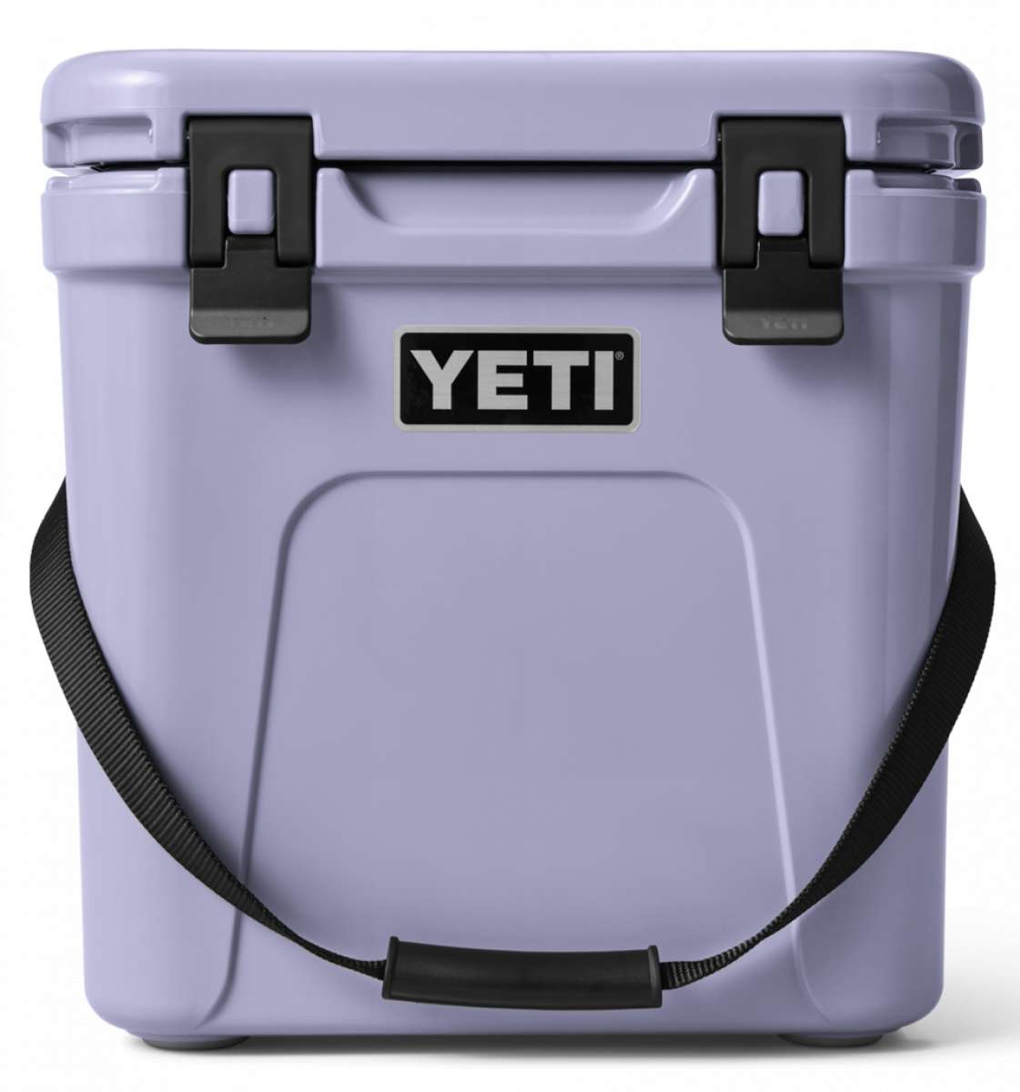 Yeti Roadie 24 Hard Cooler - A compact, portable cooler with a sleek design and a silver handle on top.