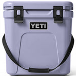 Yeti Roadie 24 Hard Cooler - A compact, portable cooler with a sleek design and a silver handle on top.