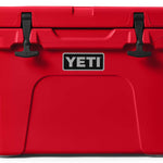 Yeti Tundra 35 Hard Cooler - A red cooler with a black handle on top and two latches in front.