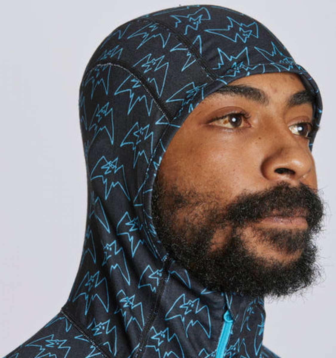 Airblaster Classic Ninja Suit 2024 - Black ninja suit with a repeating pattern of light blue stars and triangles.