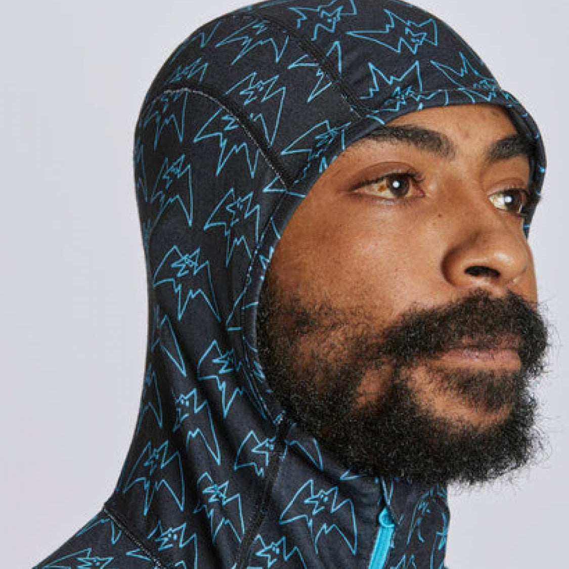 Airblaster Classic Ninja Suit 2024 - Black ninja suit with a repeating pattern of light blue stars and triangles.