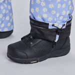 Airblaster Women's Freedom Insulated Suit 2024 - A light blue snowsuit with a repeating pattern of white daisies and yellow centers.