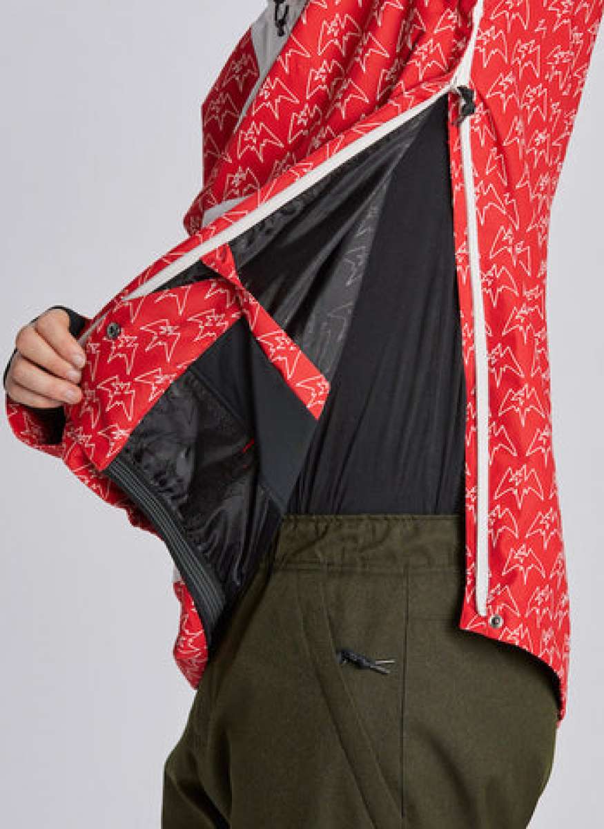 Airblaster Freedom Shell Pullover 2024 - A red pullover with a white logo pattern and black zipper.