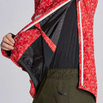 Airblaster Freedom Shell Pullover 2024 - A red pullover with a white logo pattern and black zipper.