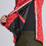 Airblaster Freedom Shell Pullover 2024 - A red pullover with a white logo pattern and black zipper.