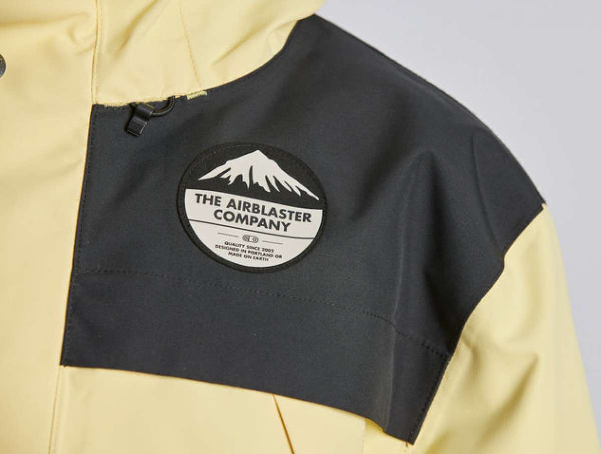 Airblaster Guide Shell Jacket 2024 - A black jacket with a white logo on the chest featuring a mountain graphic and the words "The Airblaster Company" in white text.