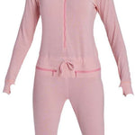 Airblaster Women's Merino Ninja Suit 2024 - A pink snowsuit with a hood and zipper down the front, featuring a star logo on the left chest area.