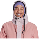 Airblaster Women's Stay Wild Insulated Parka 2024 - A pink parka with a hood and black drawstrings.