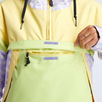 Airblaster Women's Trenchover Insulated Jacket 2022 - A pastel purple jacket with a daisy pattern on the sleeves and hood, featuring a zipper closure and adjustable cuffs.