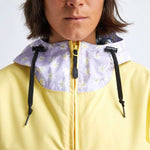 Airblaster Women's Trenchover Insulated Jacket 2022 - A women's insulated jacket with a hood, featuring a purple and white floral pattern on the upper portion of the hood.