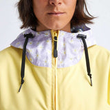 Airblaster Women's Trenchover Insulated Jacket 2022 - A women's insulated jacket with a hood, featuring a purple and white floral pattern on the upper portion of the hood.