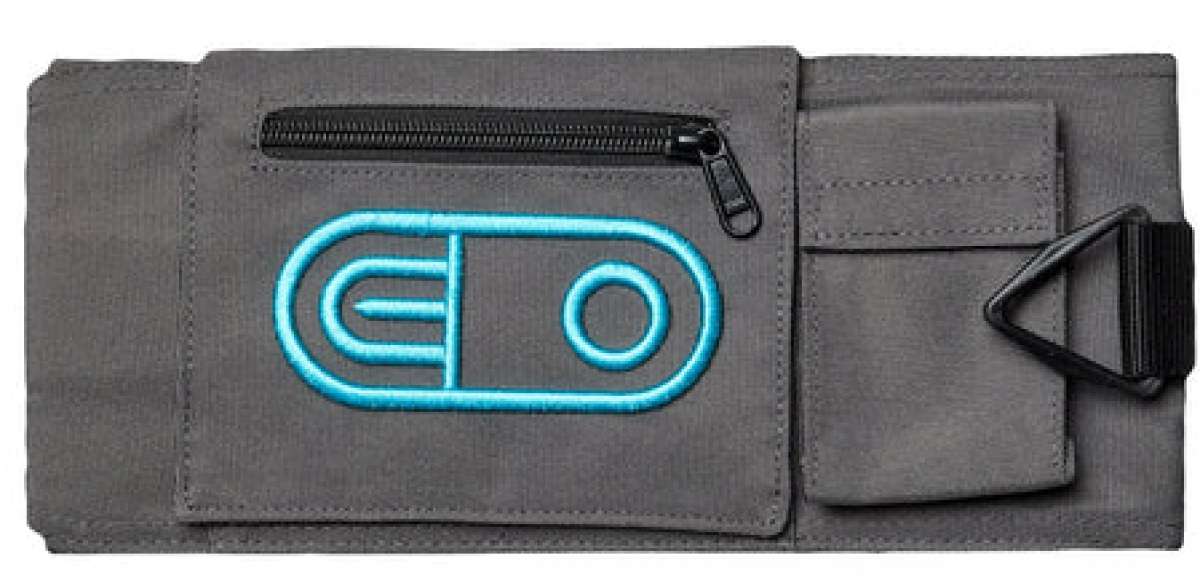 Airblaster Leg Bag 2024 - Gray bag with a black zipper on top and a blue logo in the center.