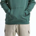 Airblaster Sasquatch ASC Hoodie 2023 - A forest green hoodie with a graphic of three Sasquatches carrying snowboards on it.