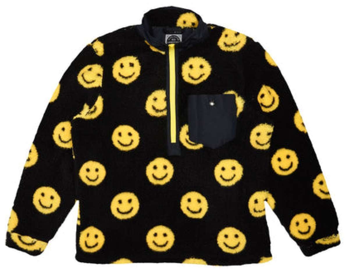 Airblaster Sherpa Half Zip Fleece Jacket 2024 - Black fleece jacket with yellow smiley faces and a black pocket on the left chest.