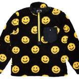Airblaster Sherpa Half Zip Fleece Jacket 2024 - Black fleece jacket with yellow smiley faces and a black pocket on the left chest.