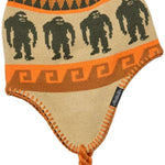 Airblaster Squatchmama Knit Beanie 2024 - Tan beanie with a repeating pattern of four Bigfoot-like creatures in dark green, surrounded by an orange border and a tan background.