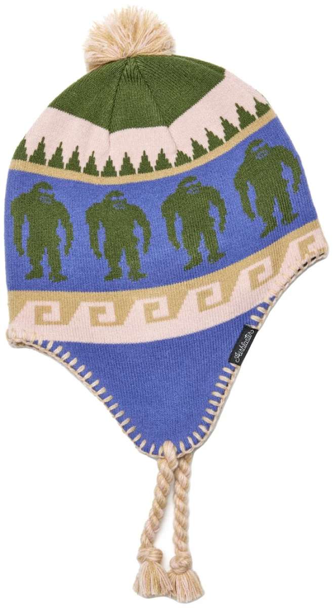 Airblaster Squatchmama Knit Beanie 2024 - A green and white knit beanie with a pom-pom on top, featuring a pattern of three green Bigfoot-like creatures across the front.