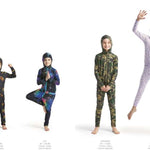 Airblaster Junior's Ninja Suit 2023 - Black ninja suit with yellow and red logos on chest, arms, and legs.