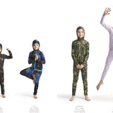 Airblaster Junior's Ninja Suit 2023 - Black ninja suit with yellow and red logos on chest, arms, and legs.