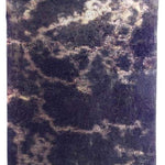 Airhole Ergo Milk Fleece Airtube - A dark gray fleece tube with a white marbled pattern and an oval-shaped hole on the left side.