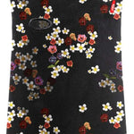 Airhole Hinge Milk Fleece Balaclava - A black balaclava with a milk-colored logo on the left side of the chest area.