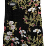 Airhole Hinge Polar Fleece Balaclava - A black balaclava with a floral pattern of white and pink flowers, green leaves, and brown stems.