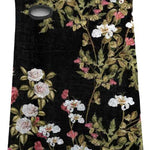 Airhole Hinge Polar Fleece Balaclava - A black balaclava with a floral pattern of white and pink flowers, green leaves, and brown stems.