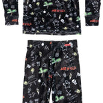Airhole Milk Fleece Thermal Set 2023 - Black fleece thermal set with white and green graphics of palm trees, skulls, and other designs.