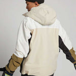 Analog Greed Jacket - A cream-colored jacket with a black stripe on the left sleeve and a brown stripe on the right sleeve.
