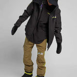 Analog Greed Jacket - Black jacket with purple, blue, green, and yellow accents on left chest area.