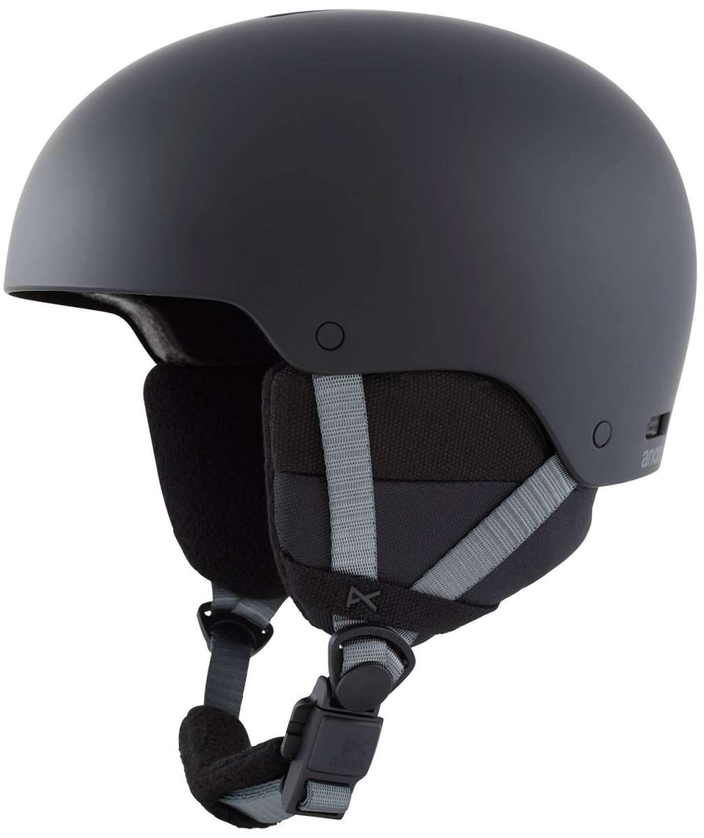 Anon Junior's Rime 3 Helmet 2024 - Matte black helmet with a sleek, aerodynamic design and adjustable vents on top.