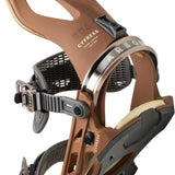 Arbor Cypress Snowboard Binding 2023 - A brown snowboard binding with a white logo on top and black buckles.