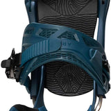Arbor Cypress Snowboard Binding 2023 - A blue snowboard binding with a black strap and buckle, featuring a wood grain pattern on the baseplate.