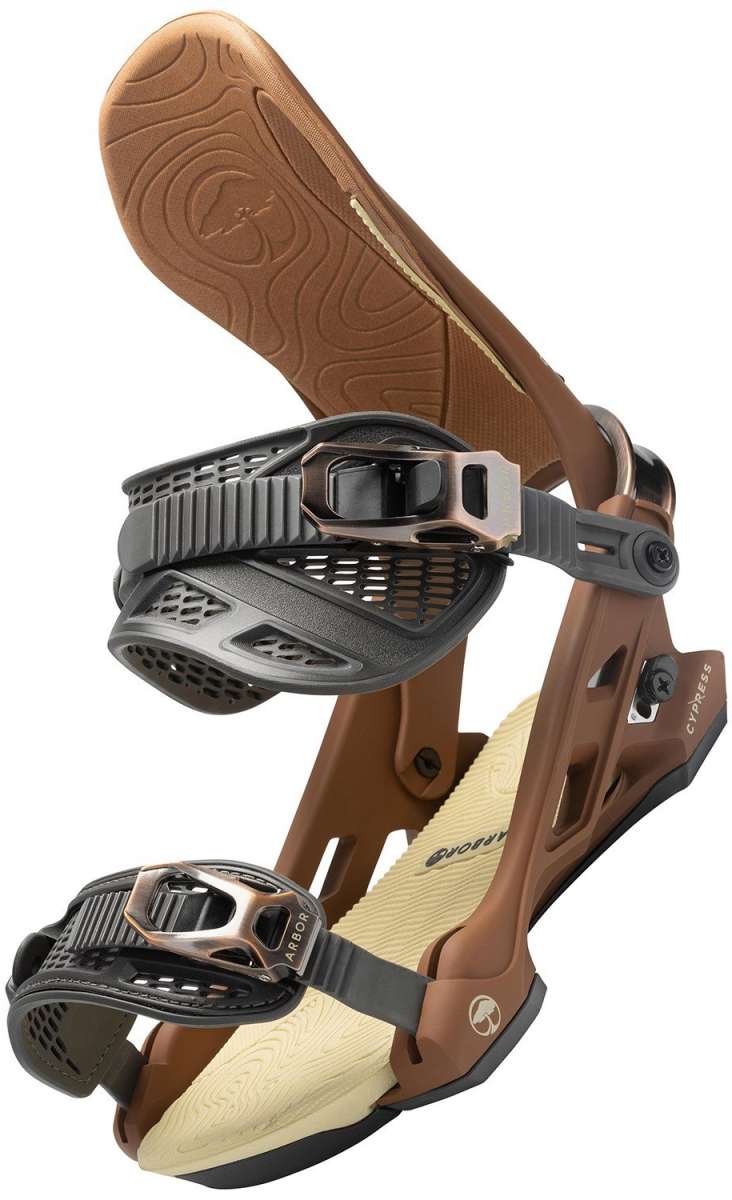 Arbor Cypress Snowboard Binding 2023 - Brown snowboard binding with black buckles and straps, featuring a wood grain pattern on the baseplate.