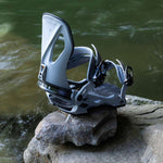 Arbor Cypress Snowboard Bindings 2024 - A pair of snowboard bindings with a sleek, modern design and silver buckles.