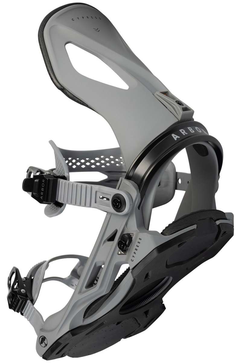 Arbor Cypress Snowboard Bindings 2024 - A pair of snowboard bindings with a predominantly white base and black accents, featuring a sleek design with cutouts on the straps.