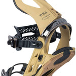 Arbor Cypress Snowboard Bindings 2024 - A pair of tan snowboard bindings with black buckles and straps, featuring a distinctive leaf logo on the top strap.