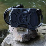 Arbor Cypress Snowboard Bindings 2024 - Black bindings with silver buckles and screws on a gray stone surface.