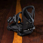 Arbor Hemlock Snowboard Bindings 2023 - Black bindings with a minimalist design, featuring a sleek black strap and a subtle logo on the side.