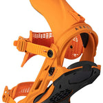 Arbor Hemlock Snowboard Bindings 2024 - A pair of bright orange snowboard bindings with black buckles and straps, featuring a textured pattern on the footbeds.