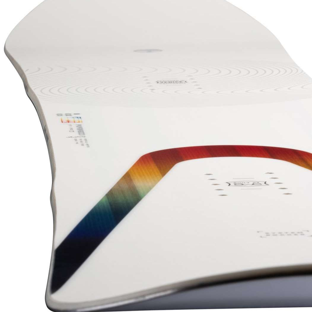 Arbor Women's Poparazzi Rocker Snowboard 2023 - A white snowboard with a rainbow-colored stripe along its edge.