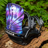 Arbor Sapling Youth Snowboard Bindings 2024 - A pair of black snowboard bindings with a purple tie-dye pattern on the straps.