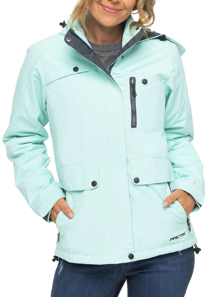 Arctix Women's Daybreak Insulated Jacket 2022 - A light blue jacket with a hood, featuring black zippers and buttons.