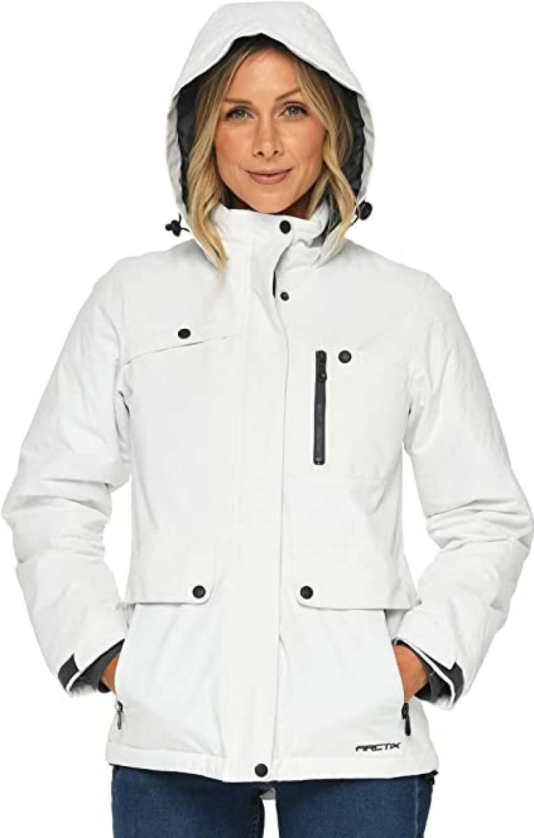 Arctix Women's Daybreak Insulated Jacket 2023 - A white jacket with a high collar and zippered chest pocket, featuring black zippers and buttons.